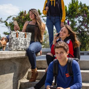 group-of-people-sitting-on-stairs-2124916